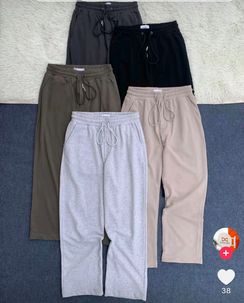 Sweatpants in Black and Grey laid flat