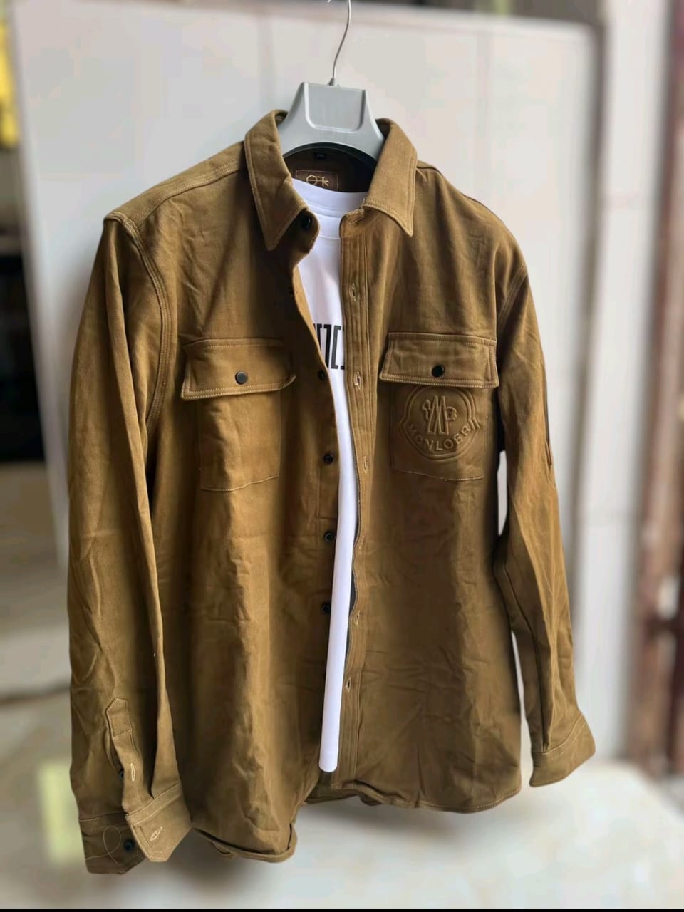 Dark Grey tactical overshirt on hanger