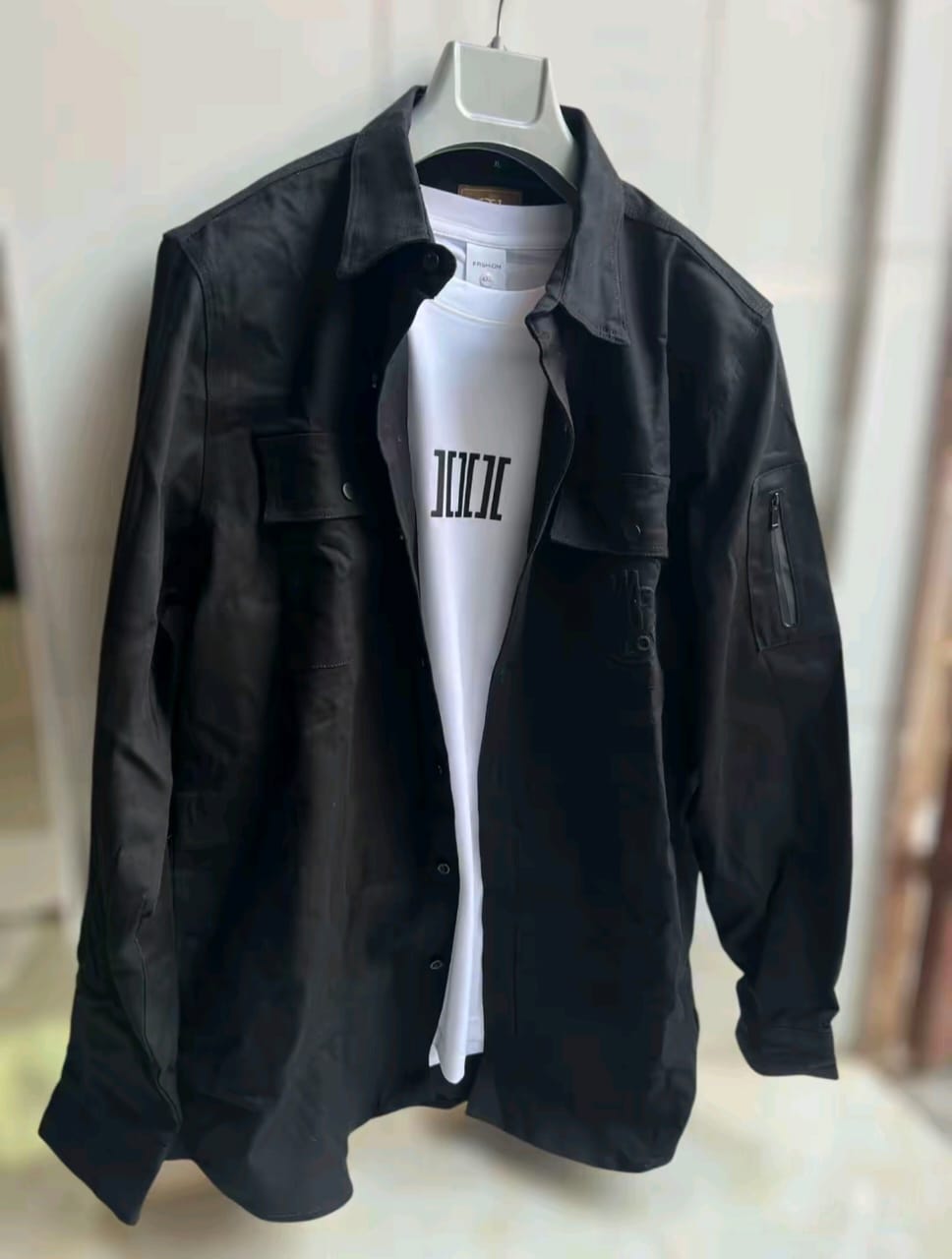 Olive/Tan tactical overshirt on hanger