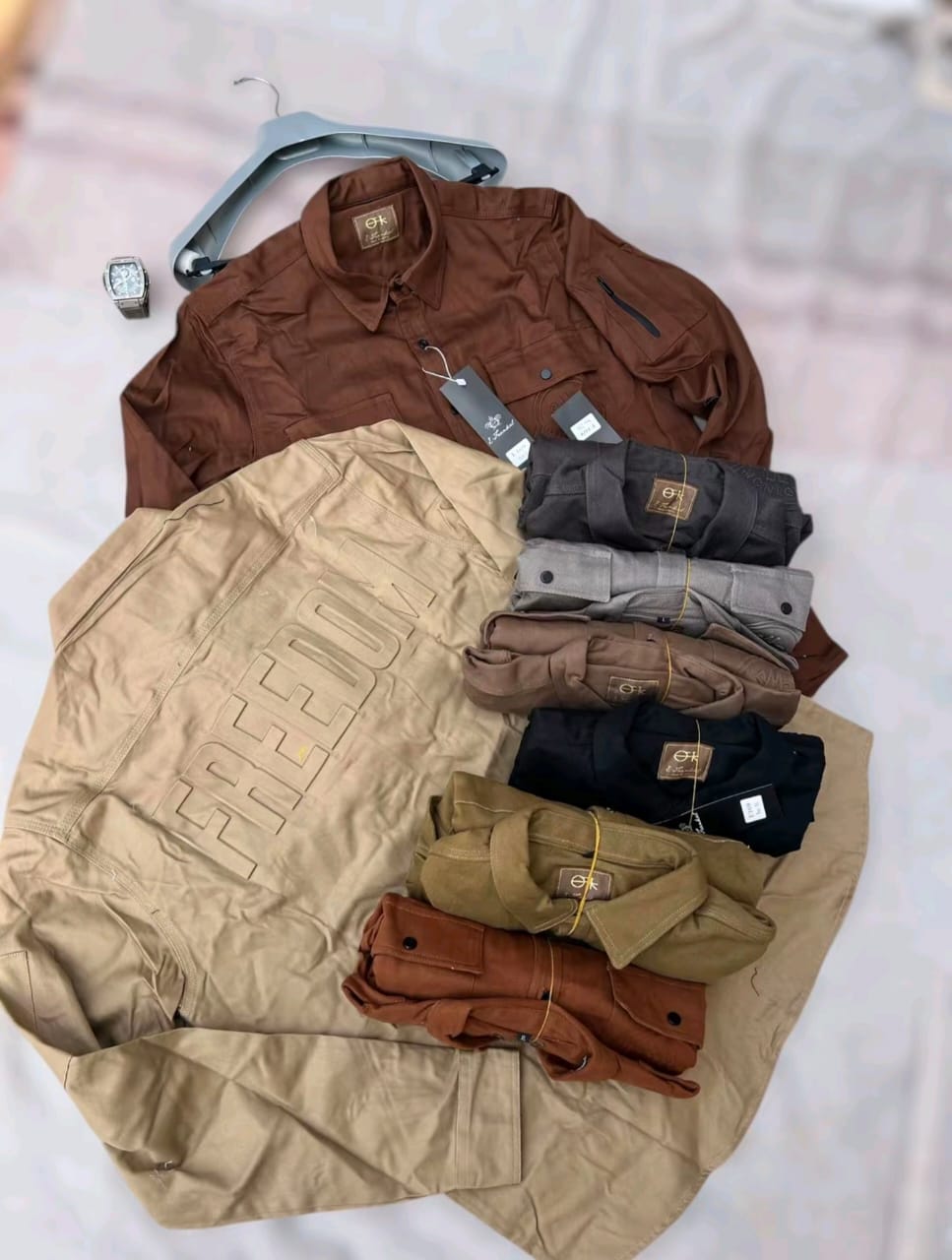 Beige/Khaki tactical overshirt on hanger