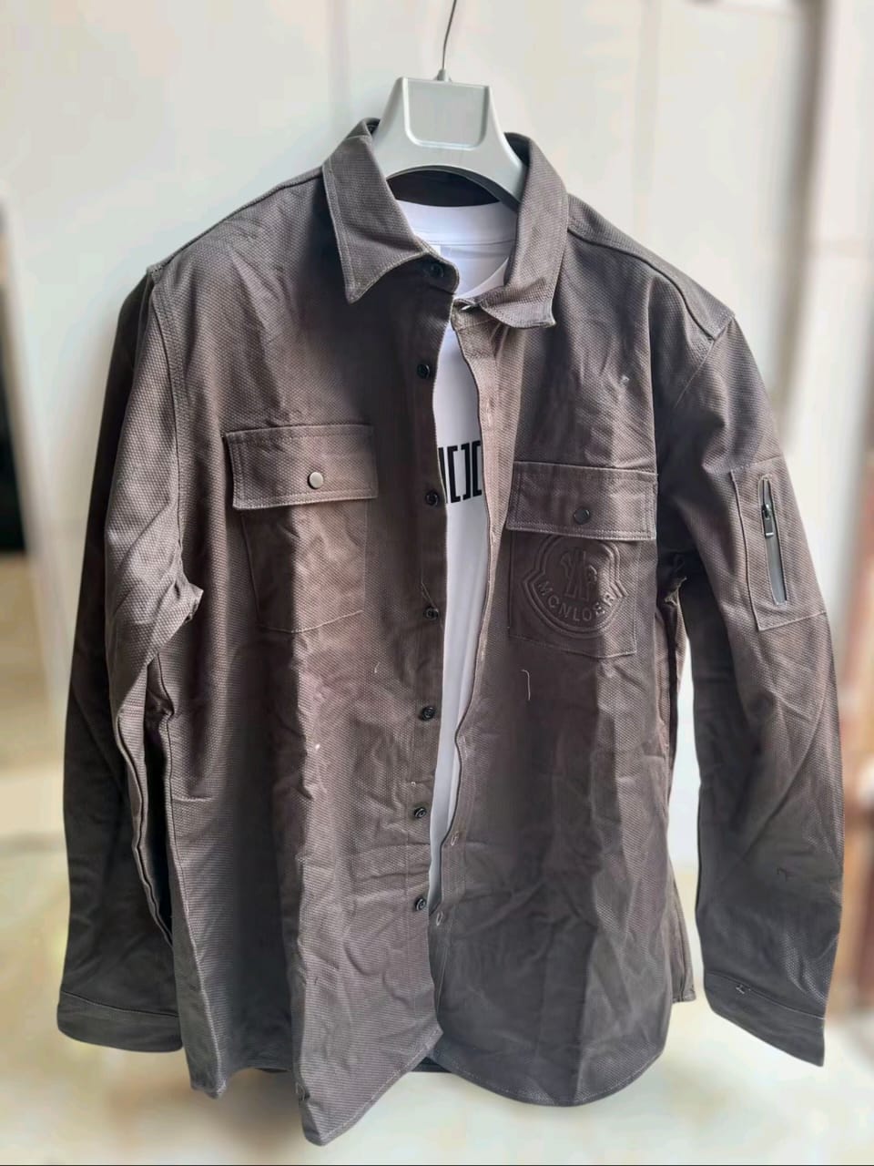 Multiple overshirt colors folded — Brown, Charcoal, Grey, Beige, Black, Olive