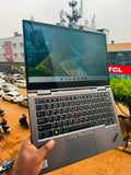 Lenovo ThinkPad X1 Yoga open showing keyboard and touchscreen display
