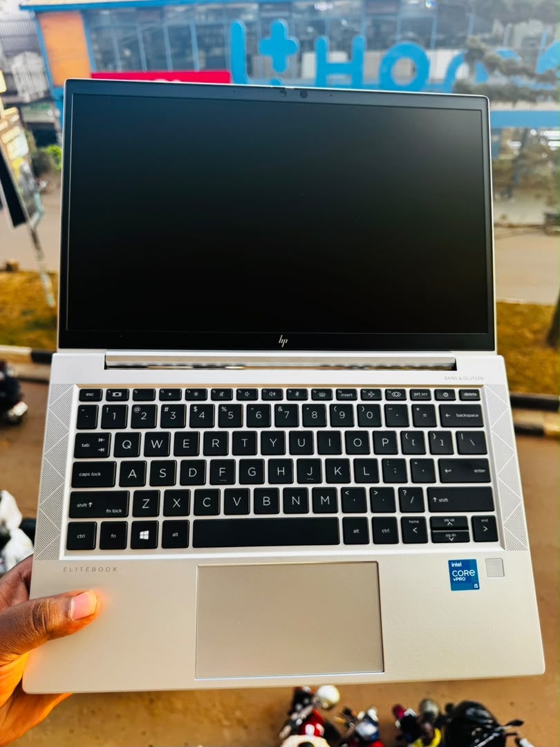 HP EliteBook 830 G8 open showing keyboard with Intel Core vPro badge and display