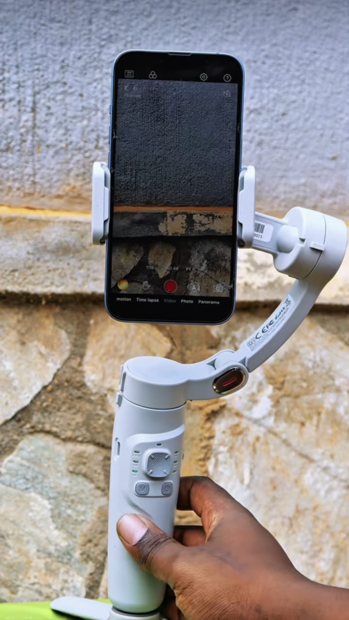 Gimbal stabilizer holding smartphone - side angle