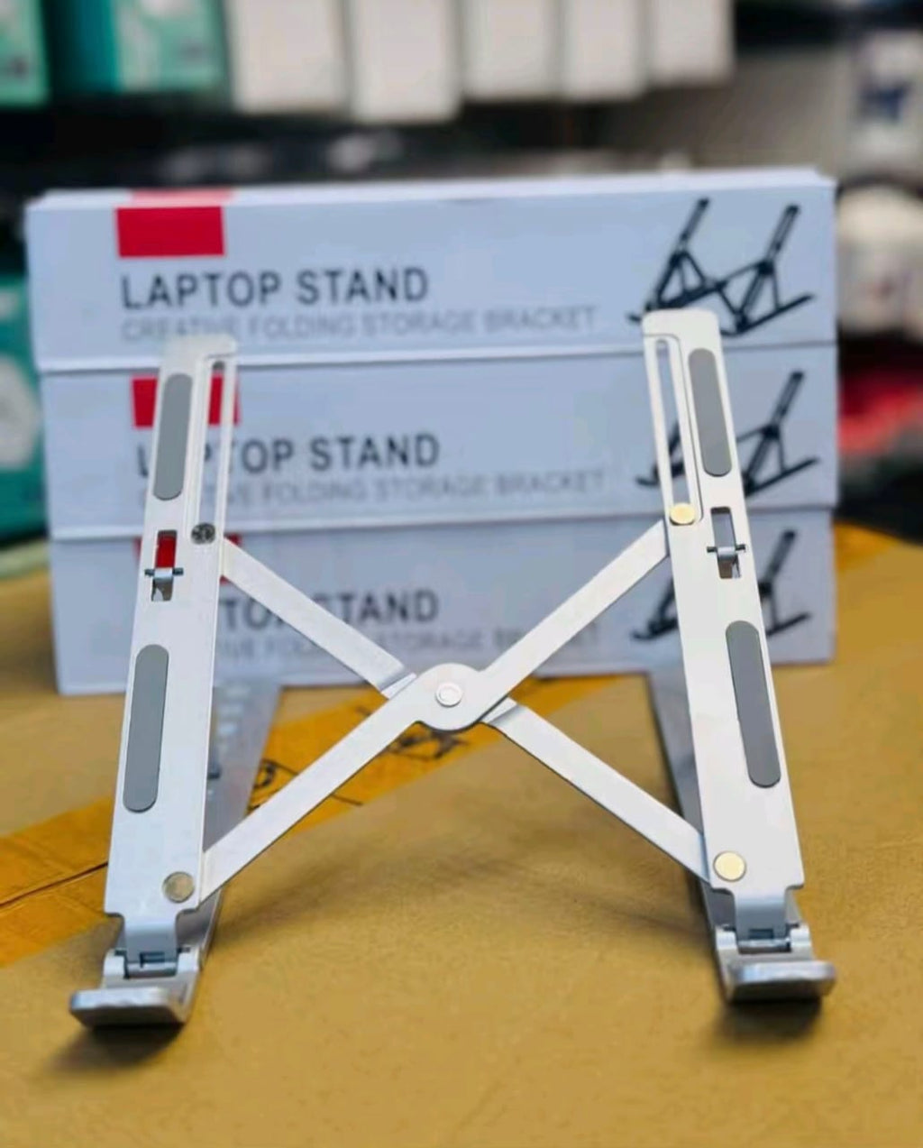 Laptop stand in use with laptop