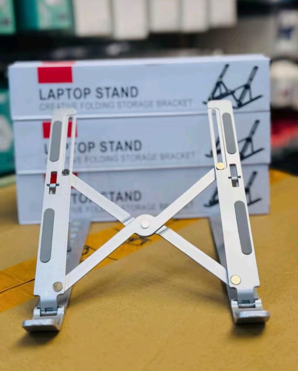 Laptop stand in use with laptop