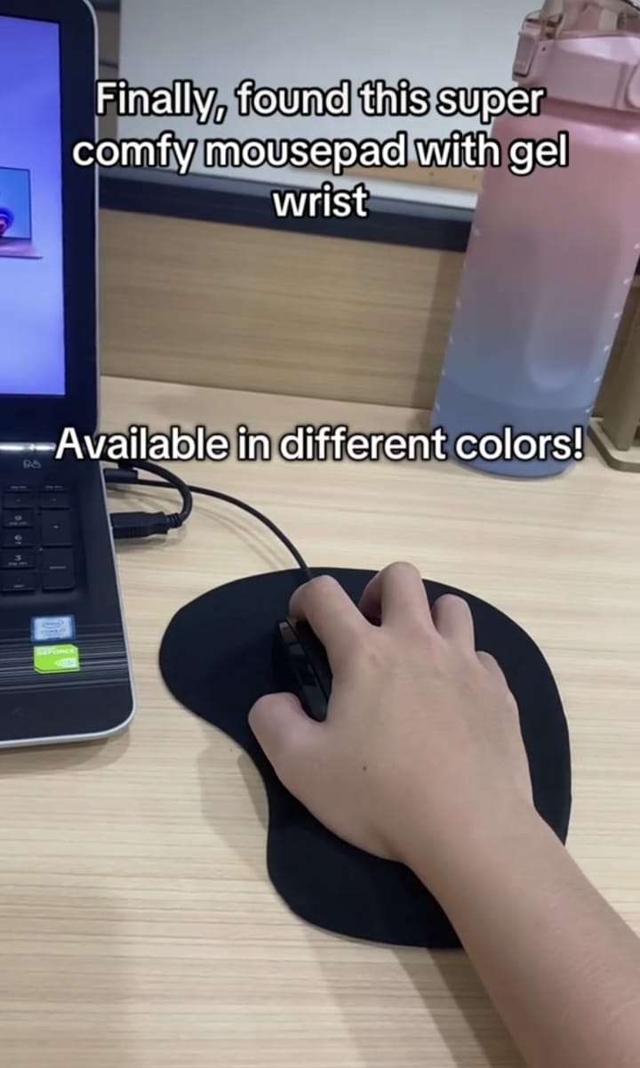 Mouse on ergonomic gel wrist mouse pad close up