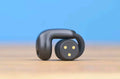Bose Ultra Open Earbud single unit front view showing charging contacts