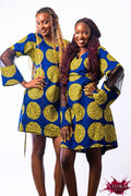 Liora Atelier Ankara Circle Print Mini Dress in blue and yellow wax print with sheer mesh sleeves