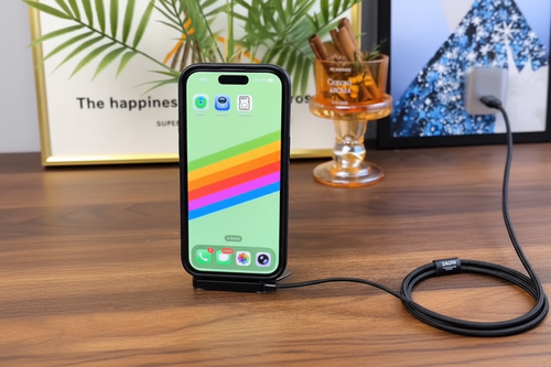 Full lifestyle shot - cable, stand and phone on desk